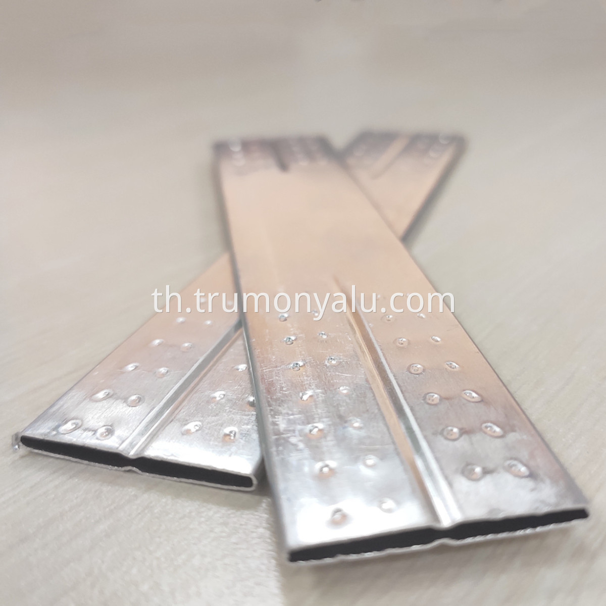 Hourglass aluminum tube